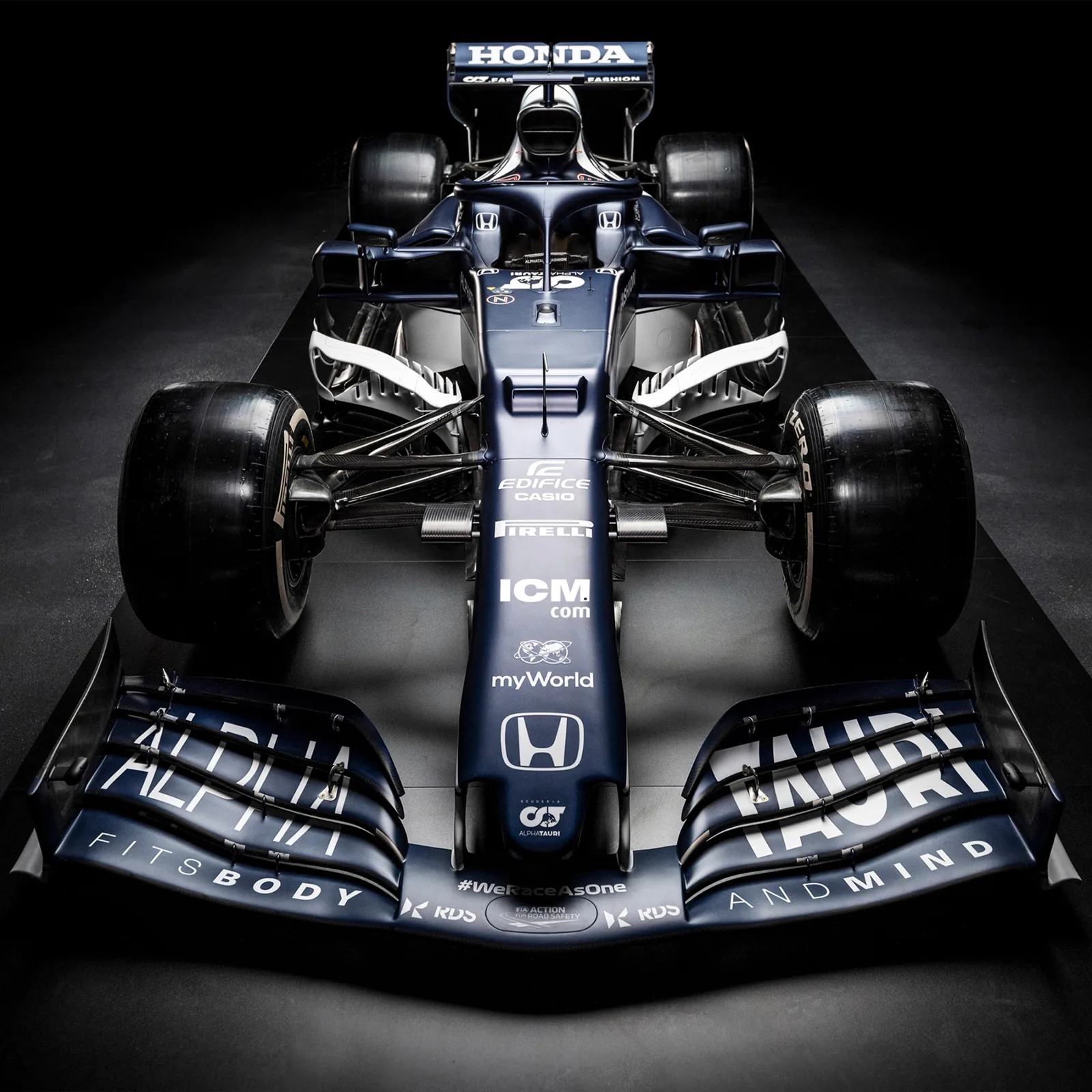 Front view of the Scuderia AlphaTauri Formula 1 car carrying the historical ICM partnership branding.