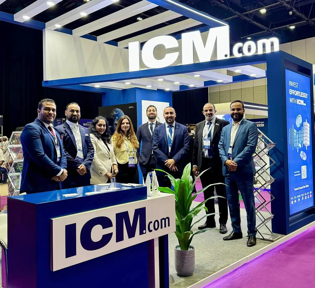 ICM exhibition stand and a group of attendees at Crypto Expo Dubai 2025.