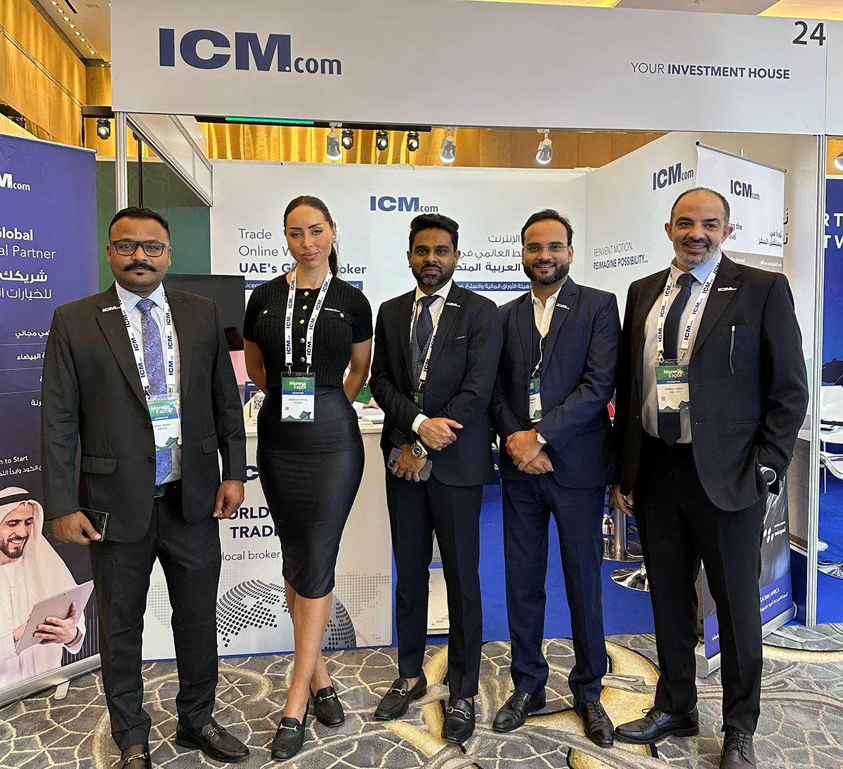 A group of representatives in front of an ICM exhibition backdrop at Money Expo Abu Dhabi 2025.